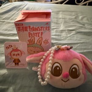 Pink and White Stuffed Animal with Cute Design